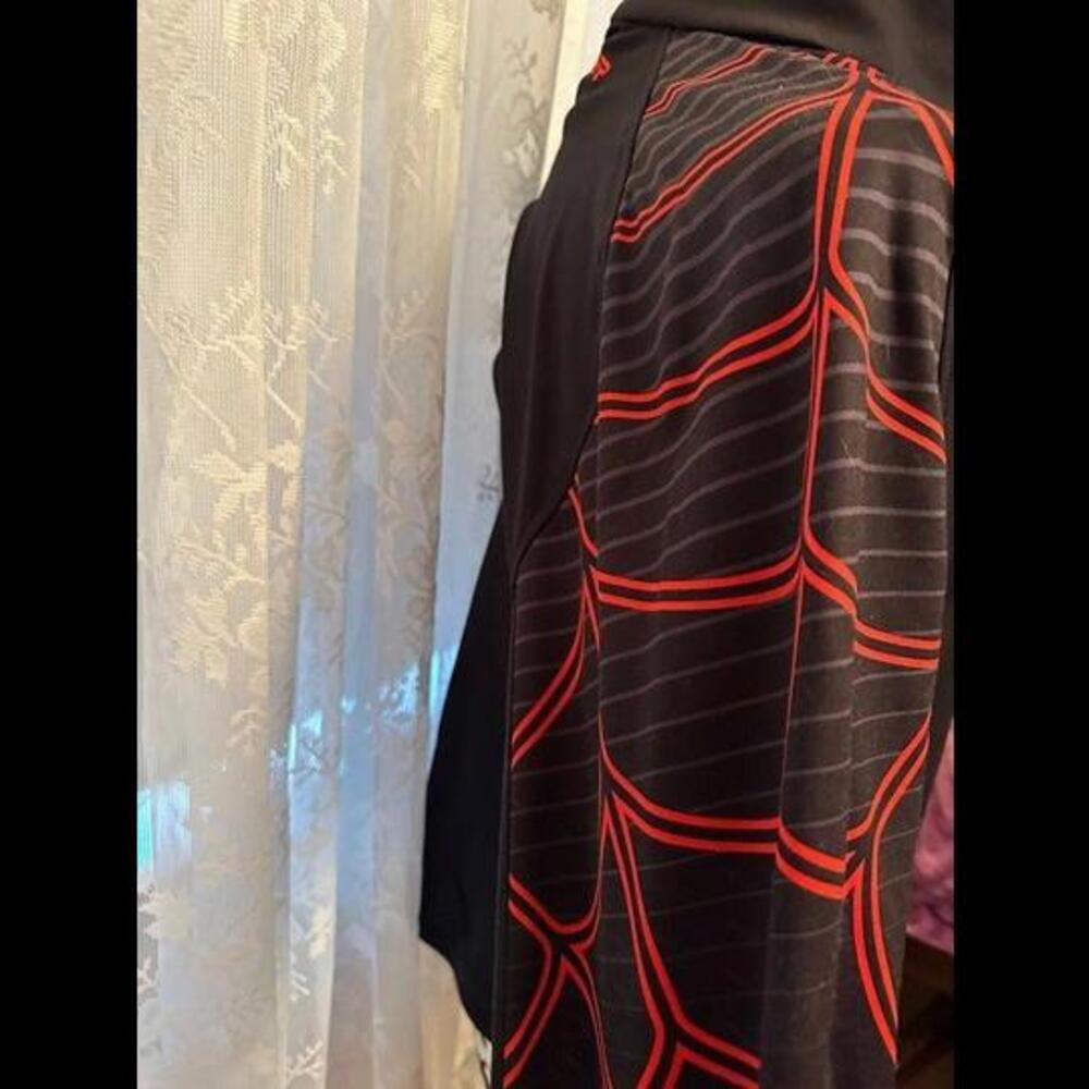 Stay Cozy and Stylish with Spyder Half-Zip Long Sleeve - Picture 2 of 3